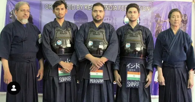 Team India in bōgu with their sensei, at an event organised by Kendo India Federation